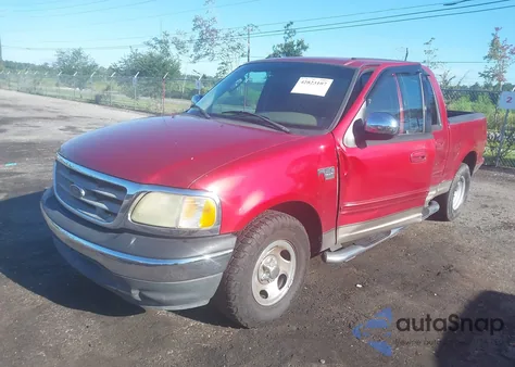 2002 Ford F-150 Lariat/Xlt z USA, uszkodzony, nr VIN 1FTRW07LX2KD47266